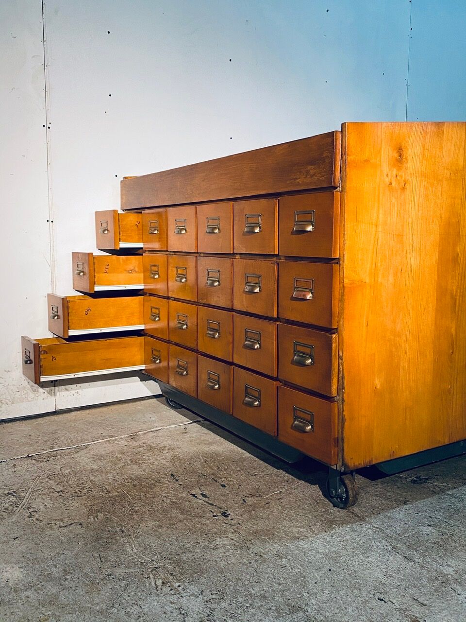 Double-sided wooden industrial filing cabinet with 48 vintage drawers