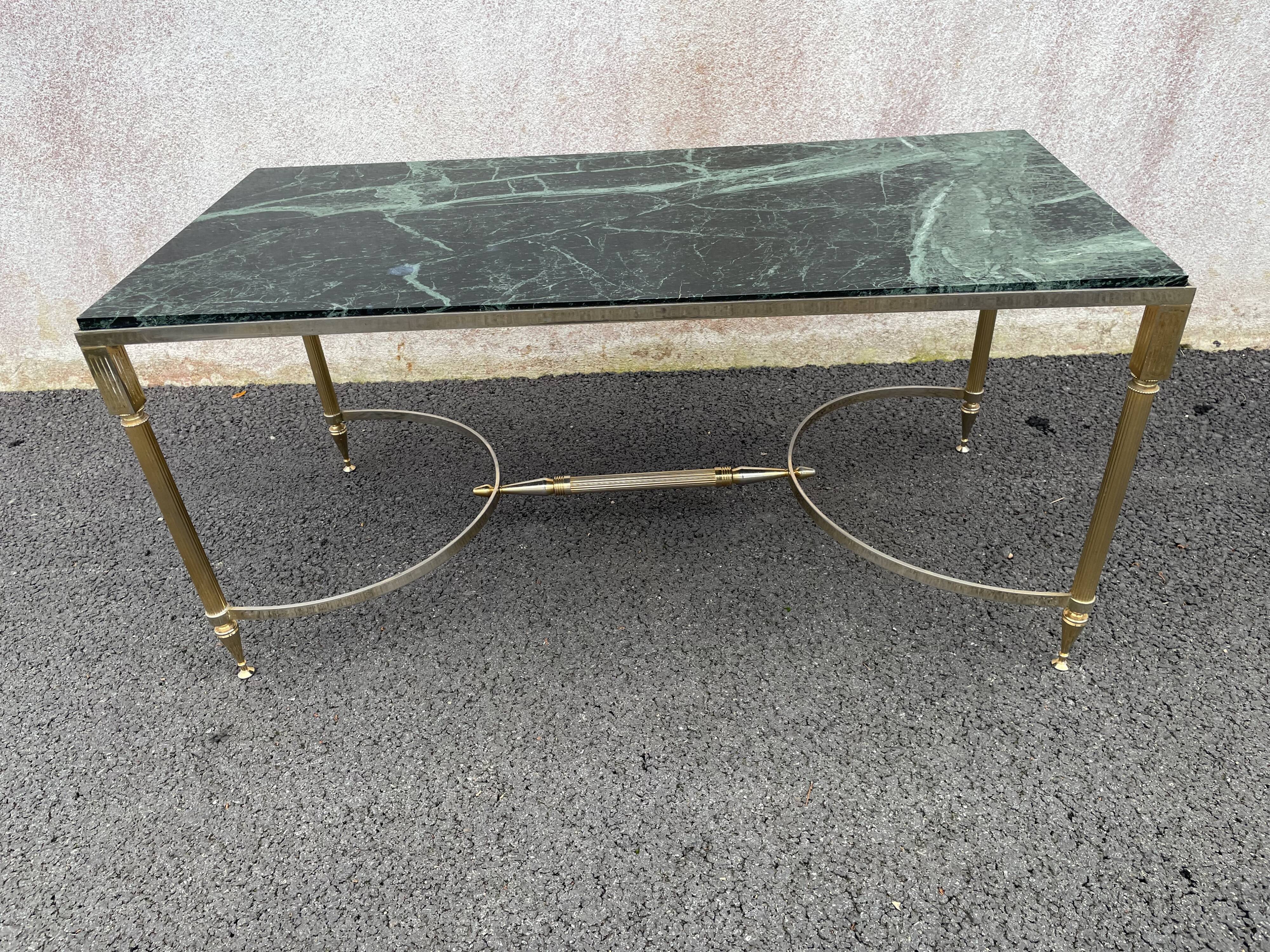 Coffee table in gilded brass and veined green marble