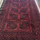 Bukhara carpet of Afghan origin, entirely hand-knotted. Dimensions: 254x154.