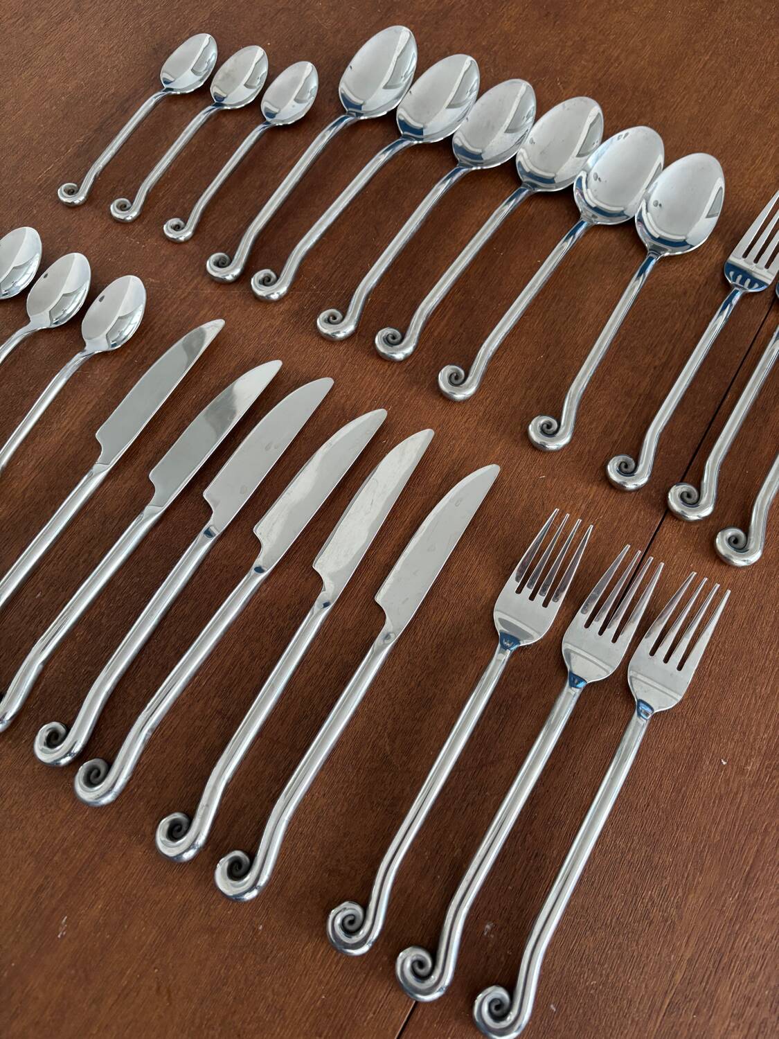 Vintage 24-piece stainless steel cutlery set with spiral handles