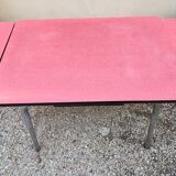 Table with two stools in red formica
