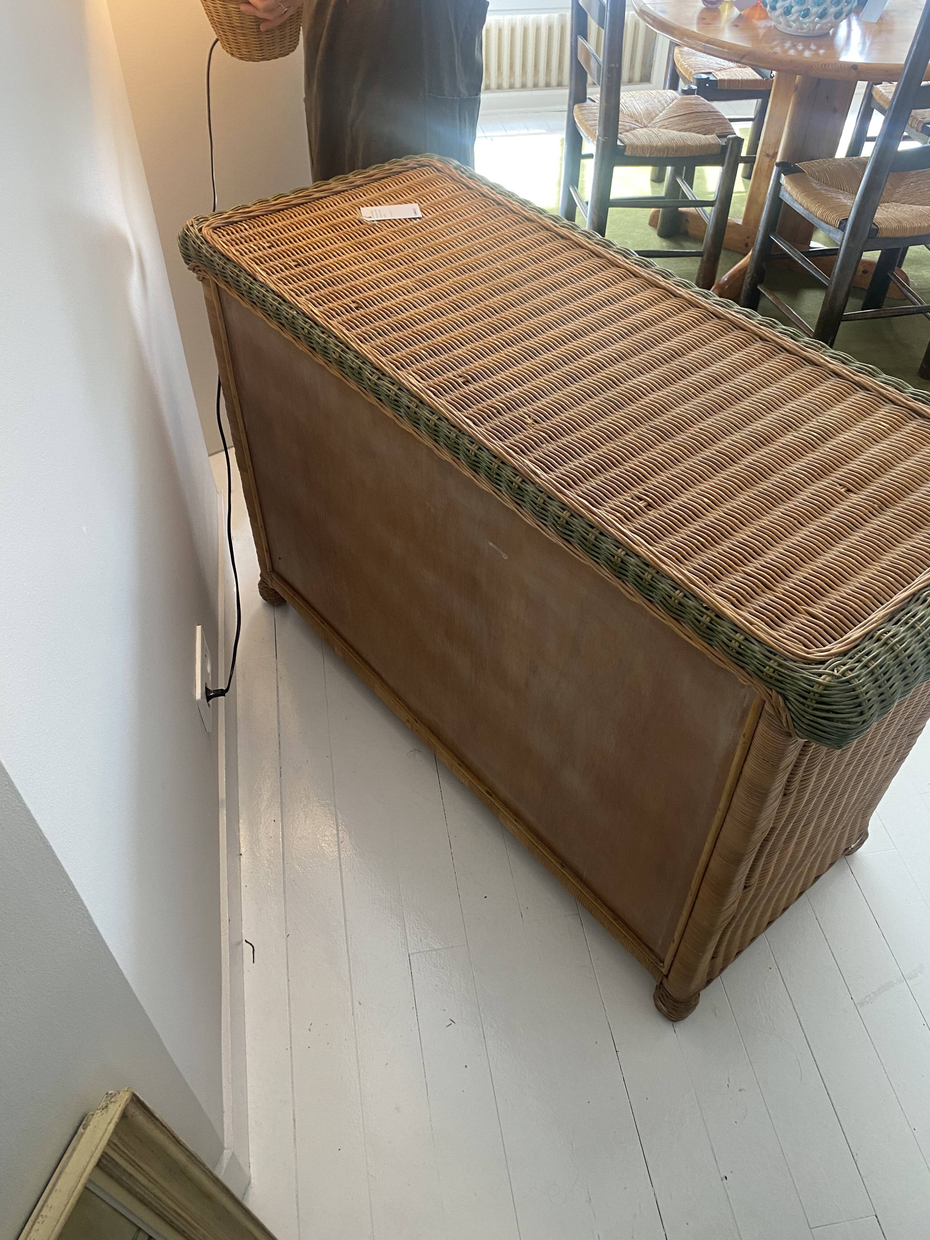rattan chest of drawers with green details