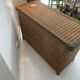 rattan chest of drawers with green details
