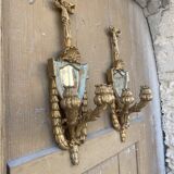 Pair of carved wood sconces