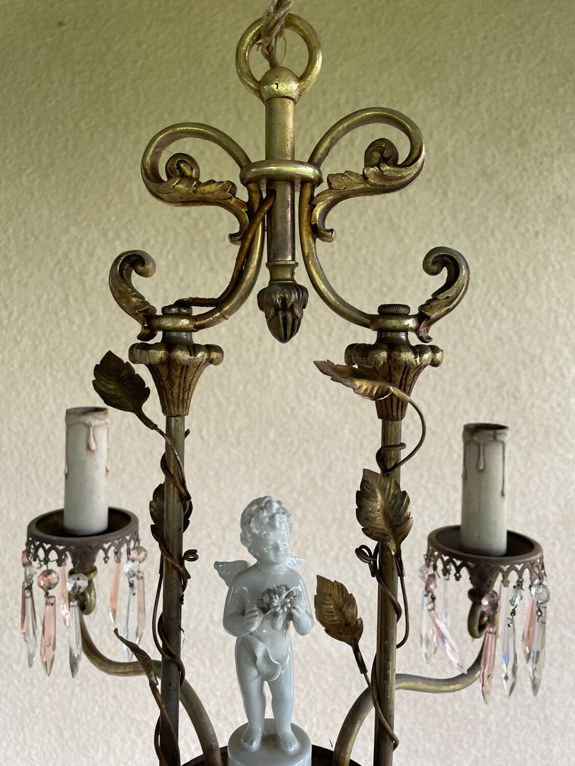 Antique bronze chandelier with porcelain angel.