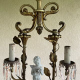 Antique bronze chandelier with porcelain angel.