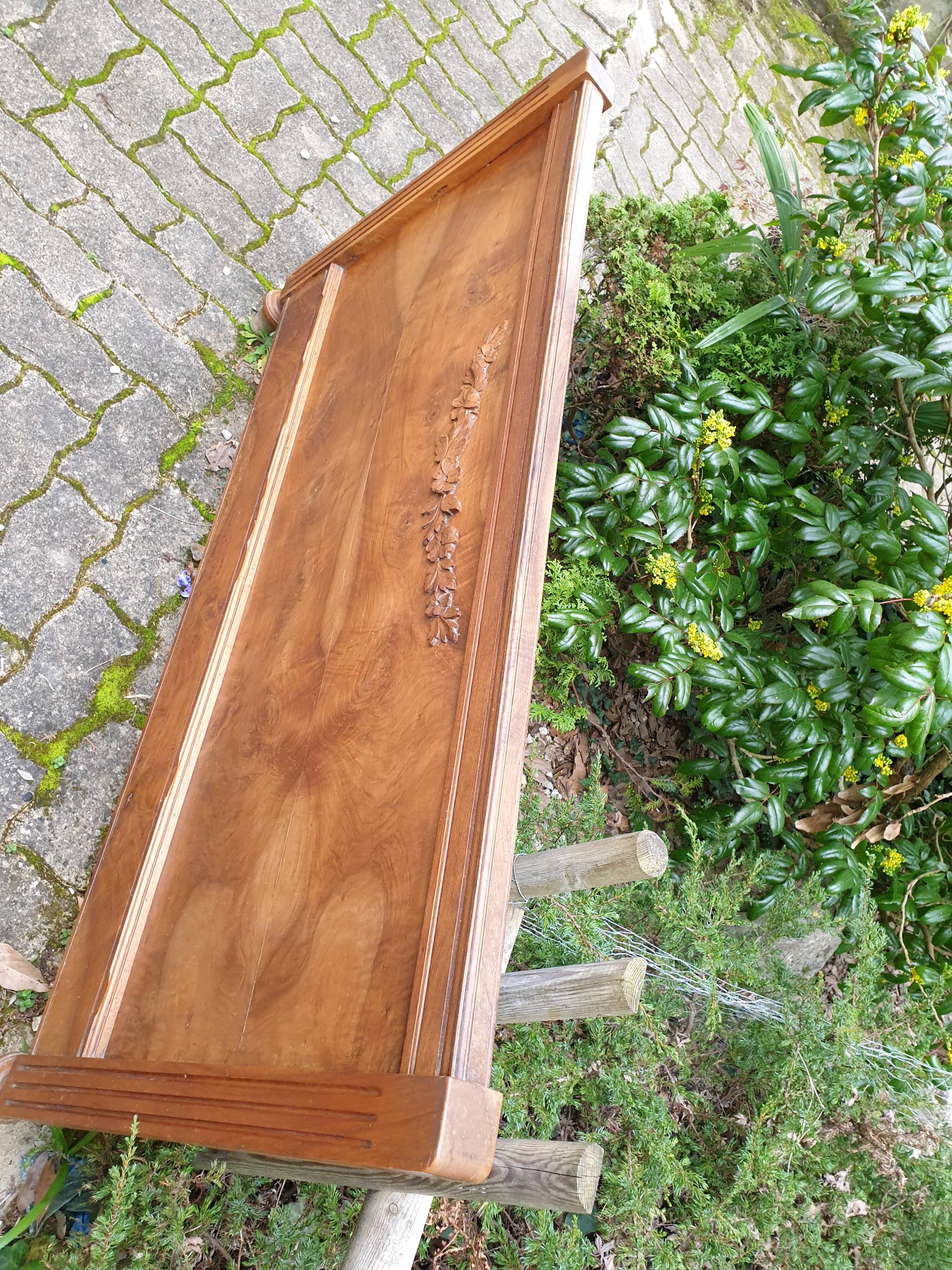 Carved walnut headboard