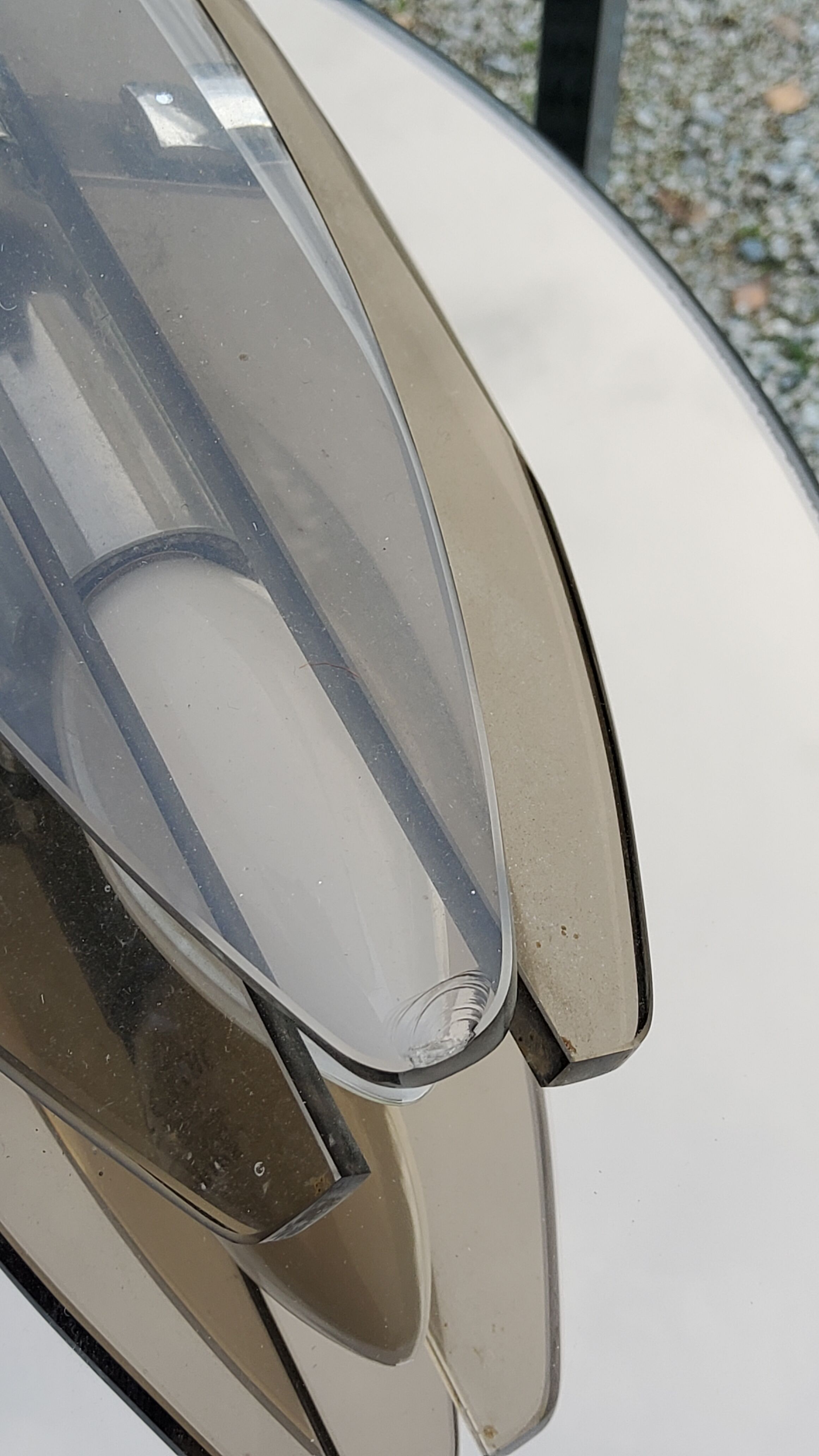 Oval mirror with 2 double tain sconces by Antonio Lupi from the 80s, 69x55 cm