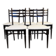 Set of 5 wooden chairs with white faux leather.