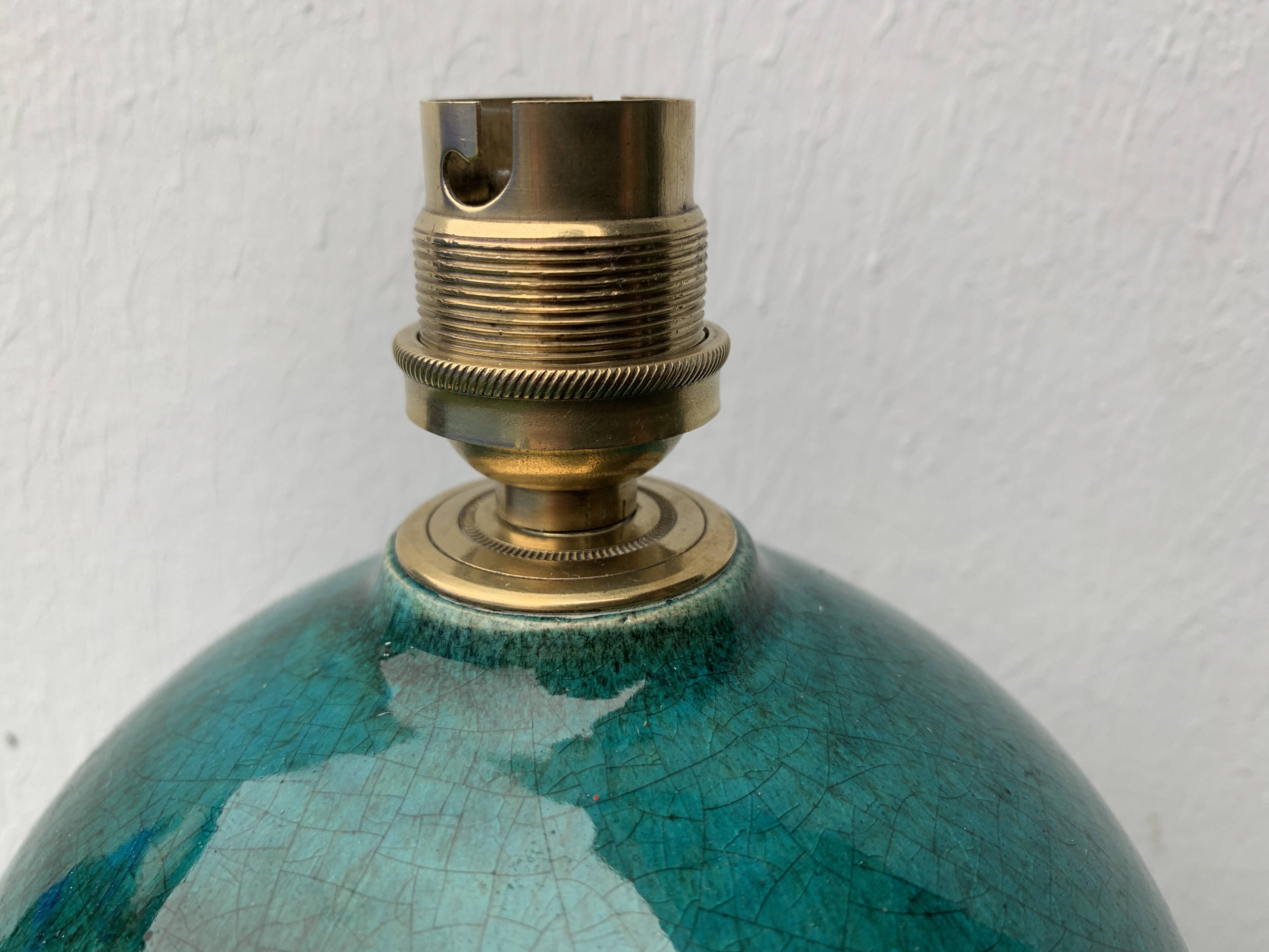 Cracked and signed ceramic ball lamp base, blue-green tones