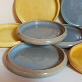 Seven vintage potter's sweet treat plates