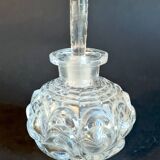 Old perfume bottle in molded