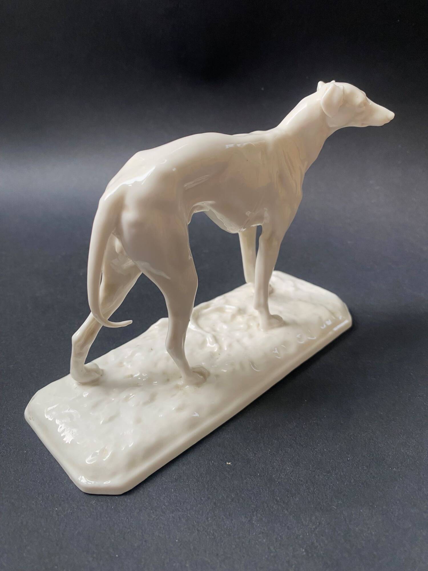 Nymphenburg porcelain greyhound sculpture signed PJ MENE