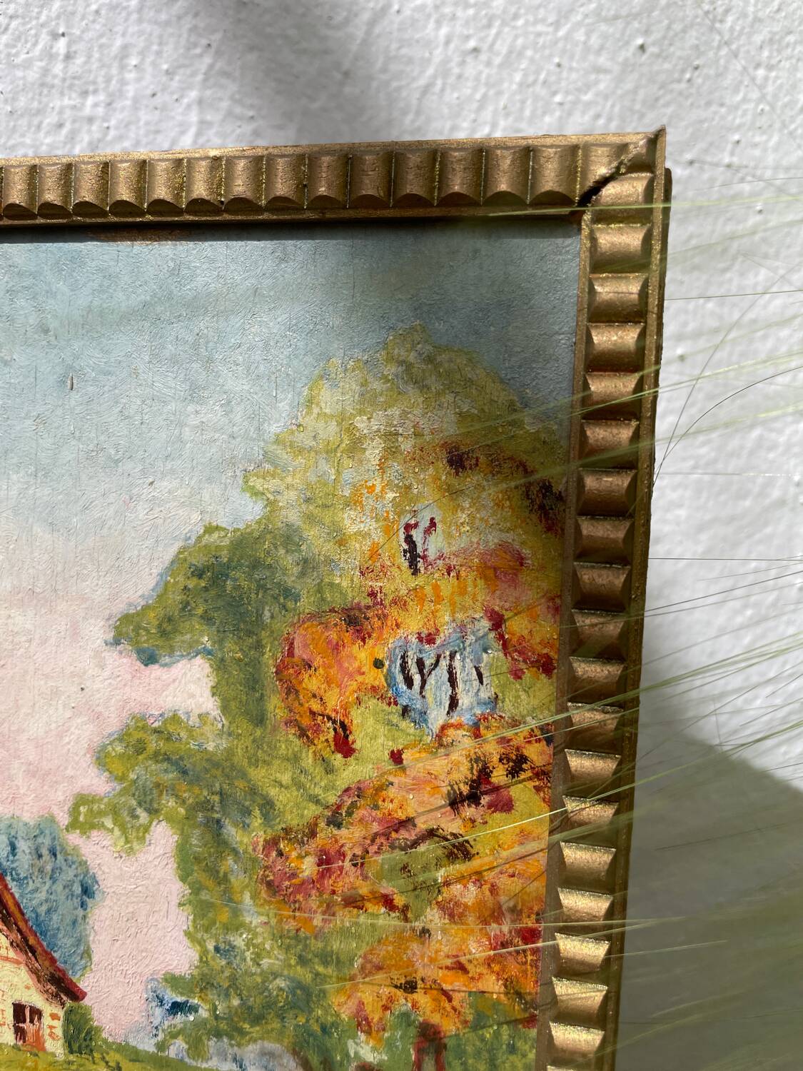 Small landscape painting with golden frame