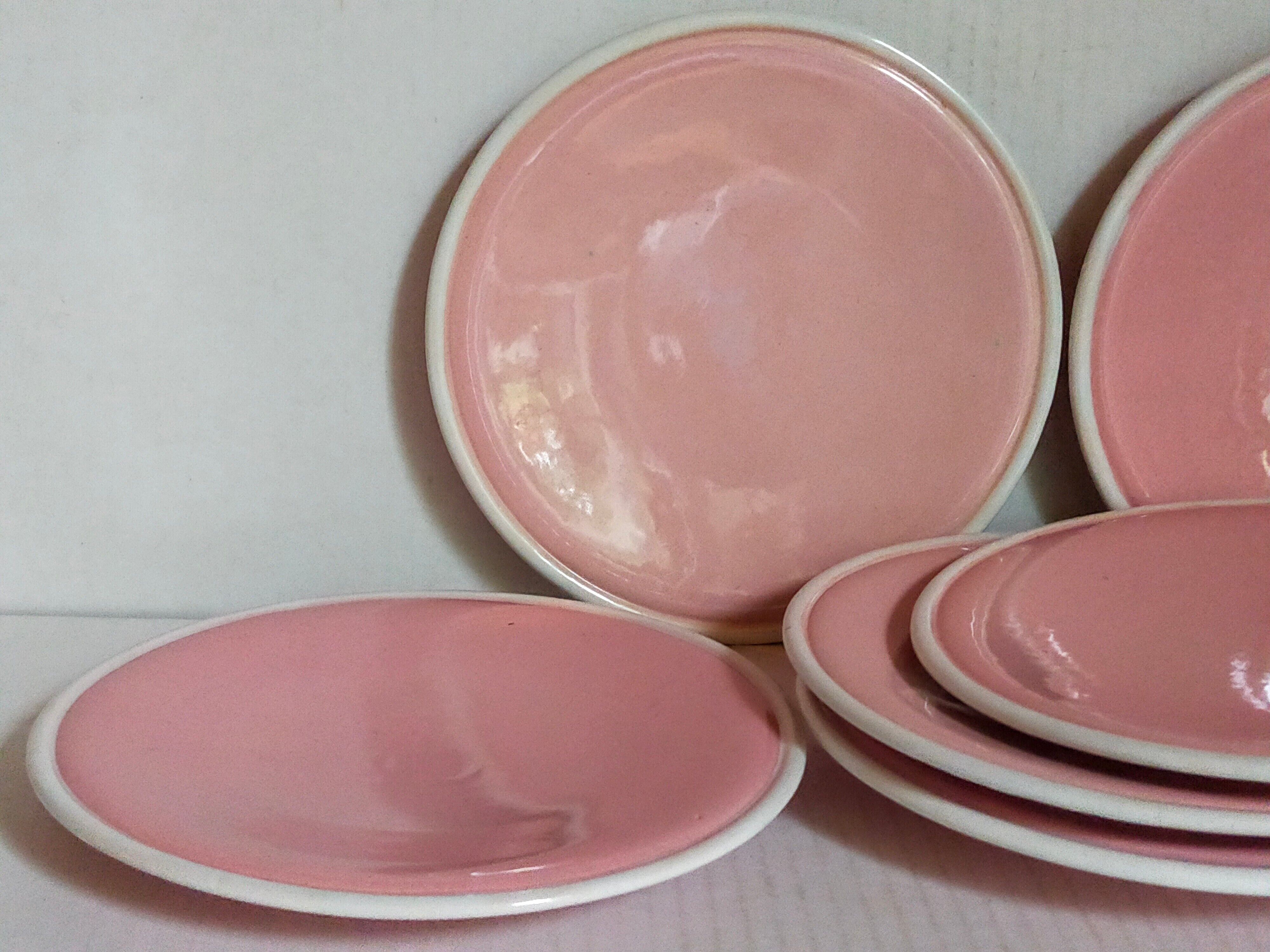 Six old pink earthenware dessert plates