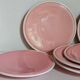 Six old pink earthenware dessert plates