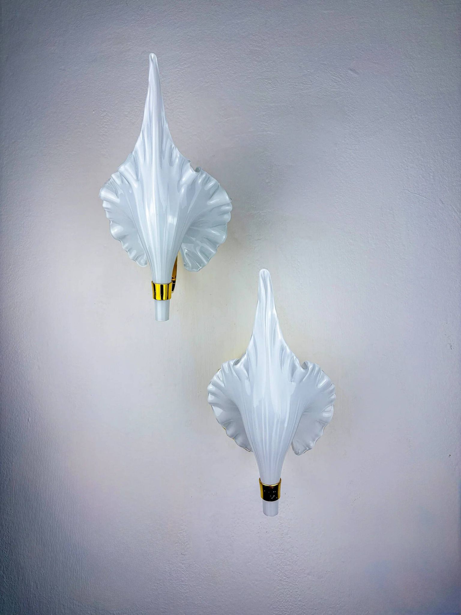 Pair of Italian "Calla Lily" leaf-shaped wall sconces, Murano glass & gilt brass, circa 1970s