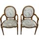 Paire de fauteuils louis XVI a dossiers médaillons