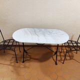 Oval carrara marble table (fixed) and two cast iron chairs