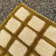 Very large Moroccan Berber rug in ecru and camel 400x300 cm with a grid pattern.