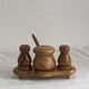 Condiment service (salt, pepper, and mustard) in olive wood
