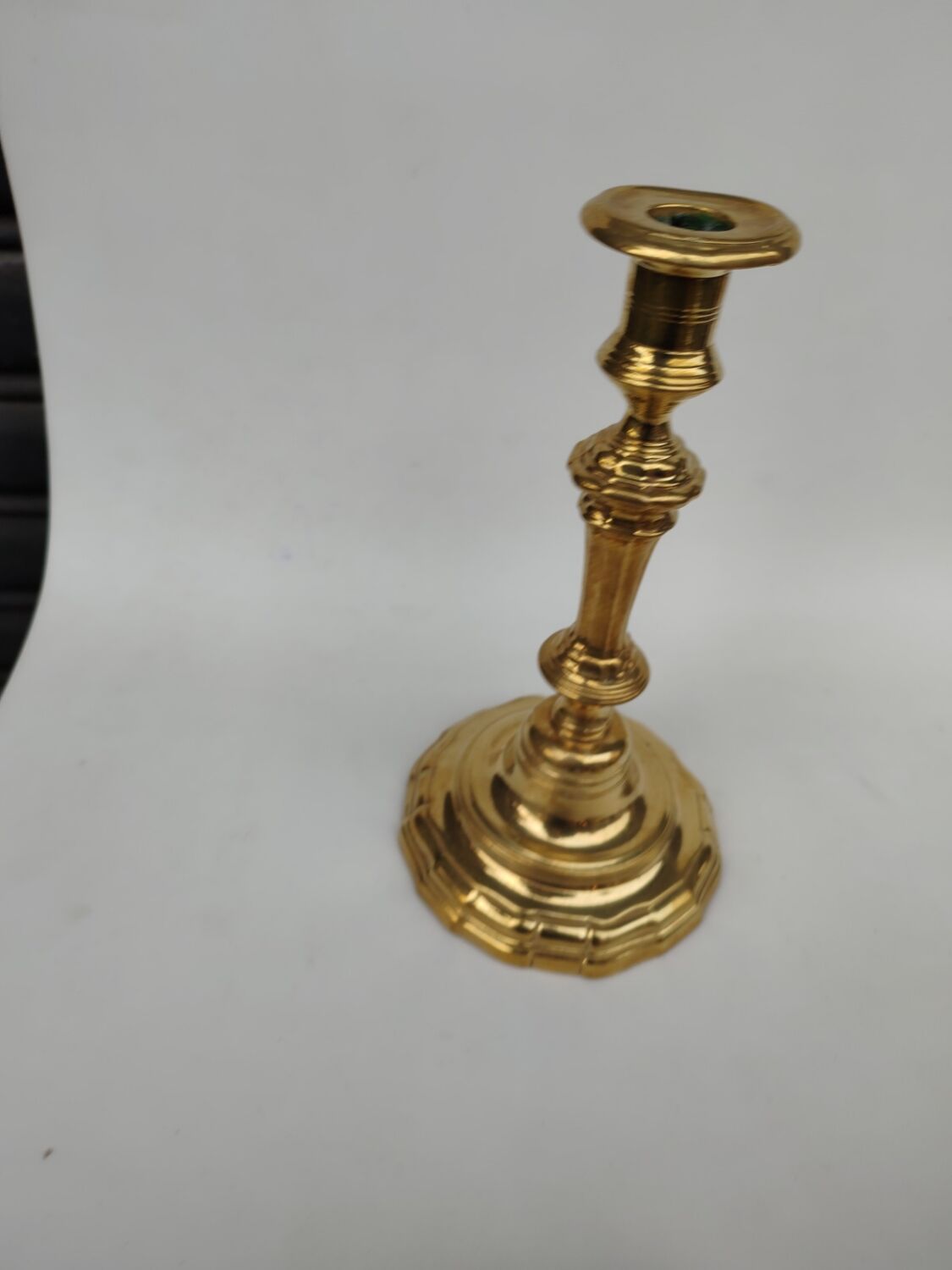 Pair of solid brass candlesticks, early 18th century.