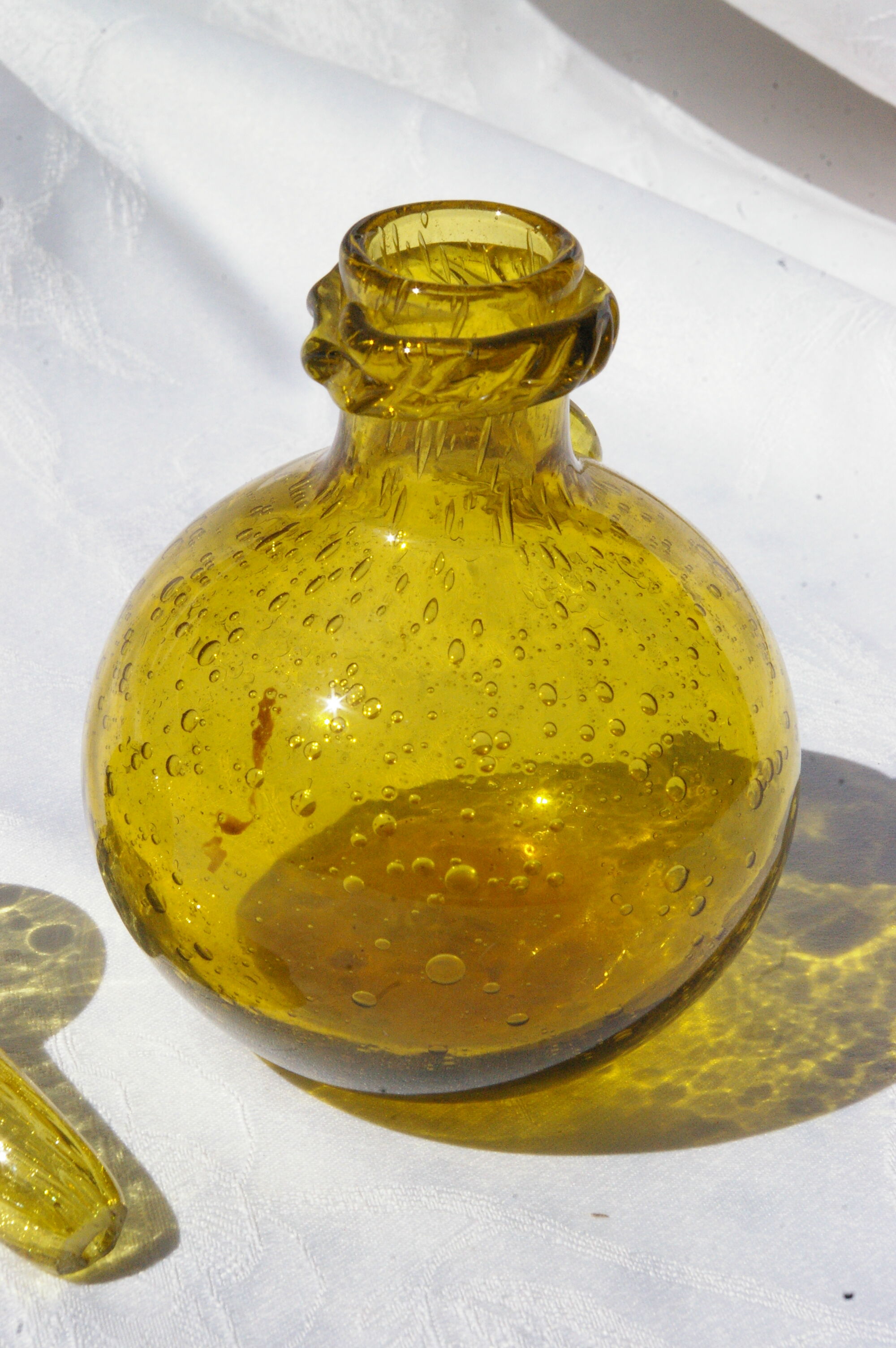 Bottle in bubbled glass of biot