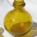 Bottle in bubbled glass of biot
