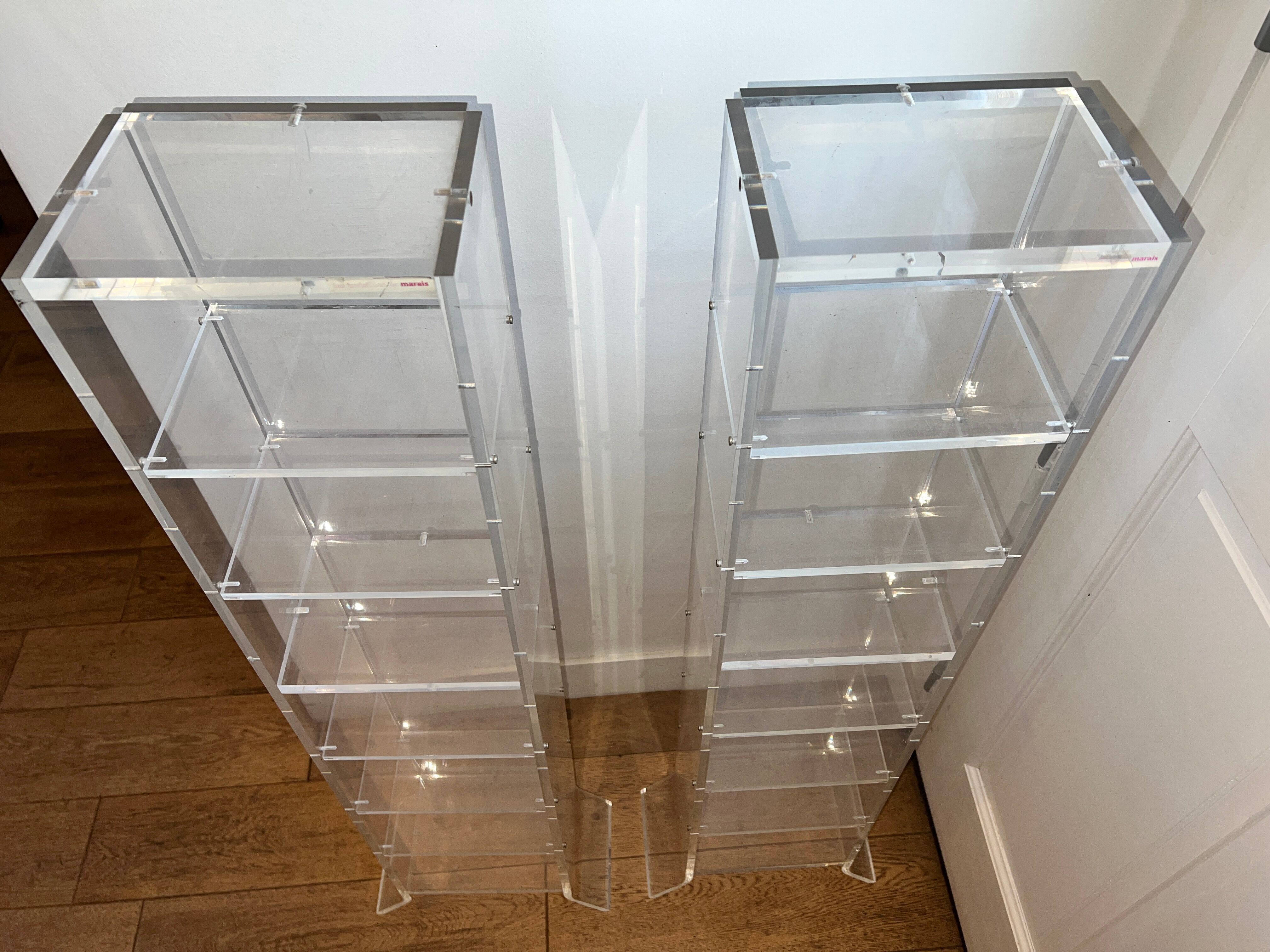 Invisible Plexiglass Shelves by Marais