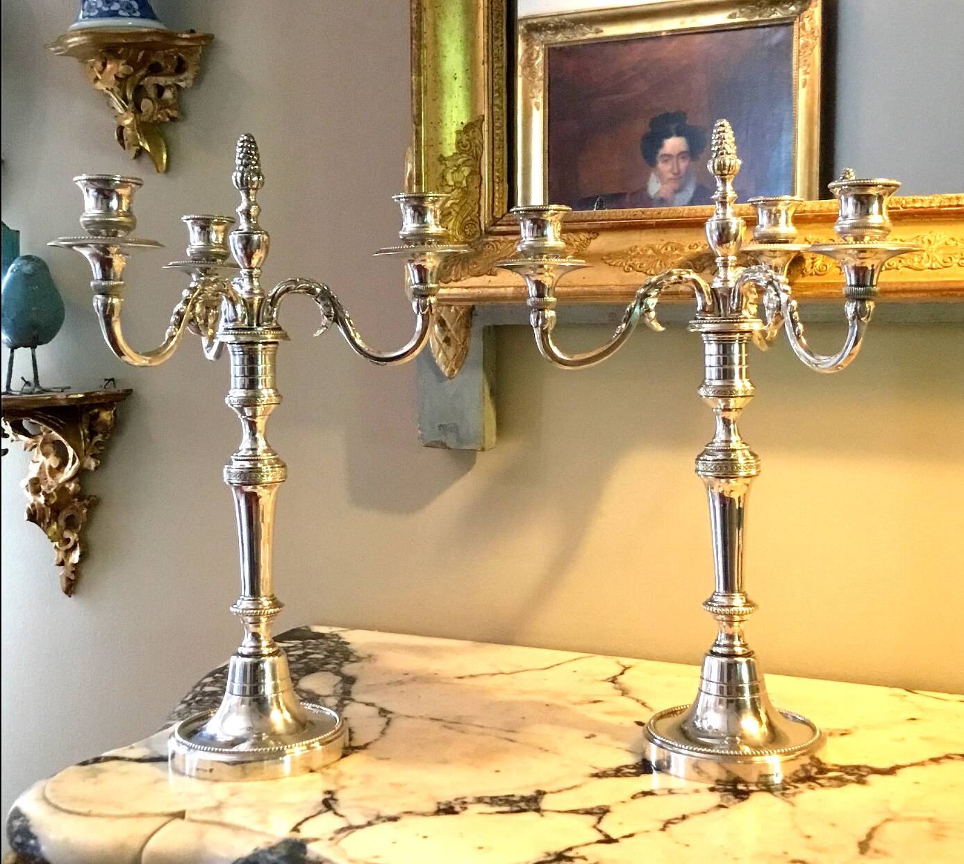 Pair of three-armed silver-plated candelabra
