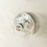 Sculptural wave wall lamp made of structured solid glass by peill & putzler