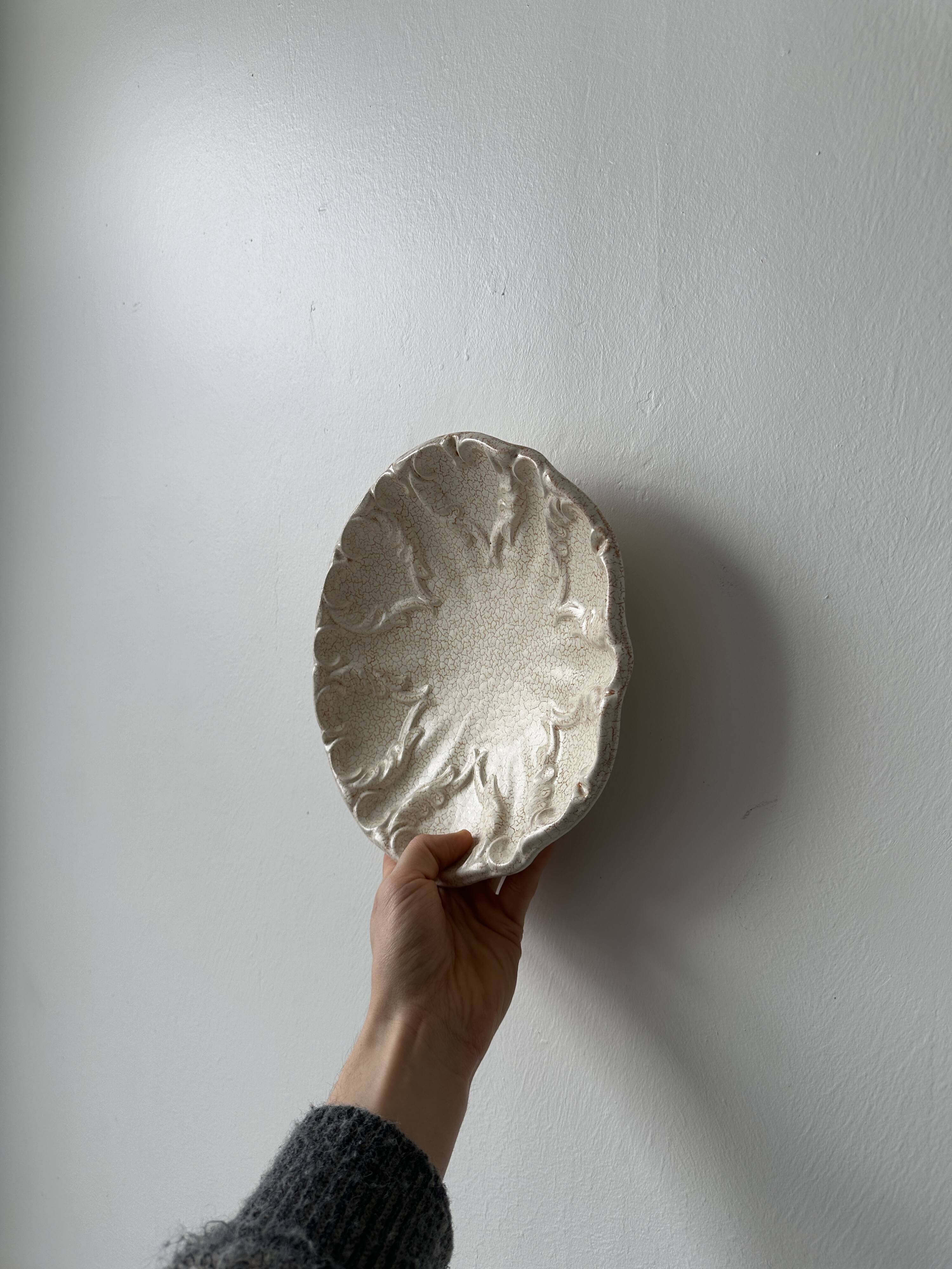 Fluted cracked terracotta dishes - fluted wall plates