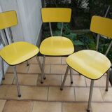 3 canary yellow formica chairs