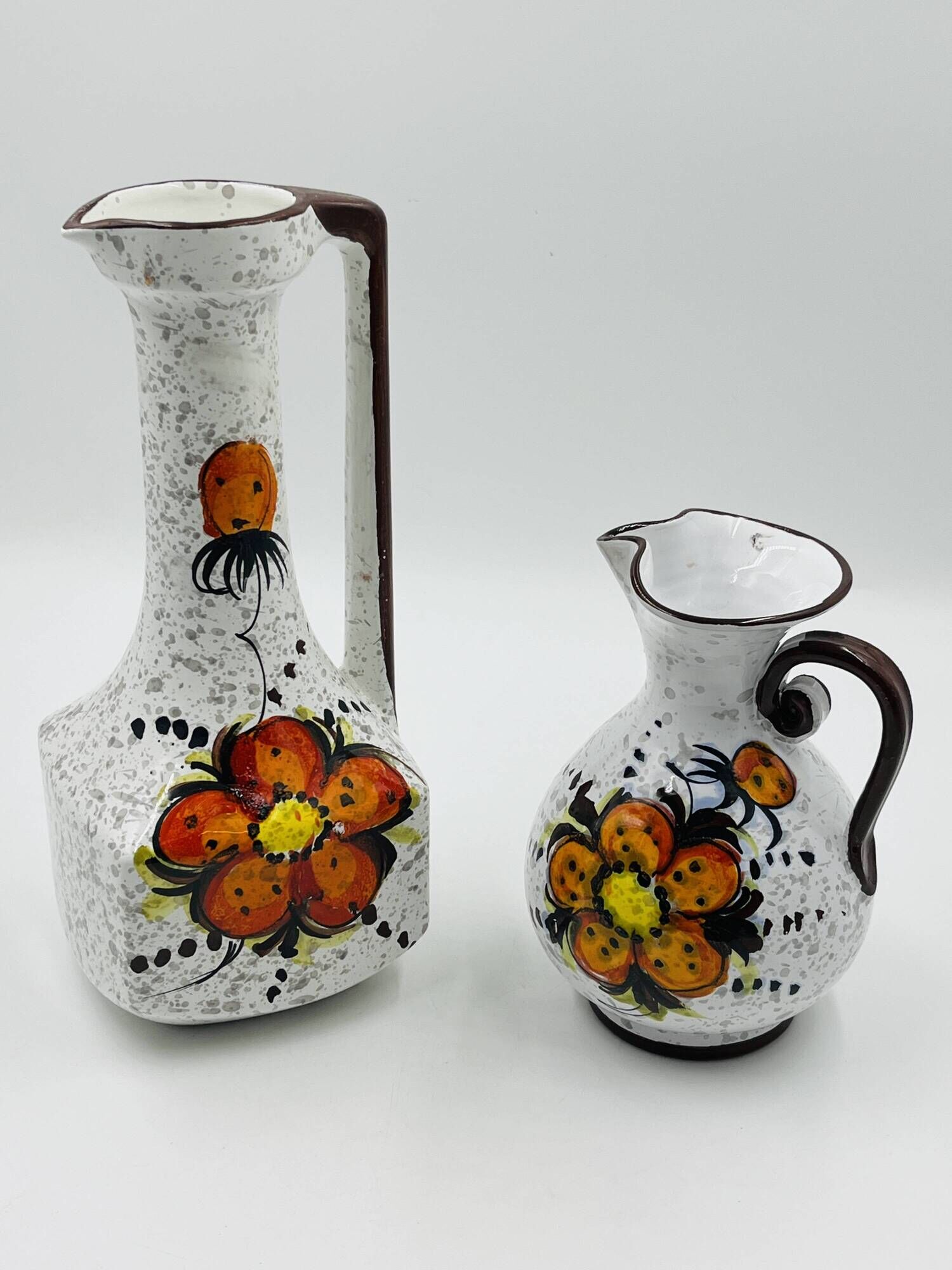 Pair of vintage hand-painted Italian floral vases
