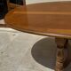Oak dining table, oval living room table with two extensions.