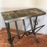 Iron and stone brutalist magazine rack