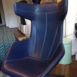 Arrow swivel armchair and foot rests by Alfredo Haberli for Moroso