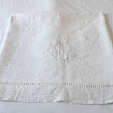 White sheet in monogrammed linen