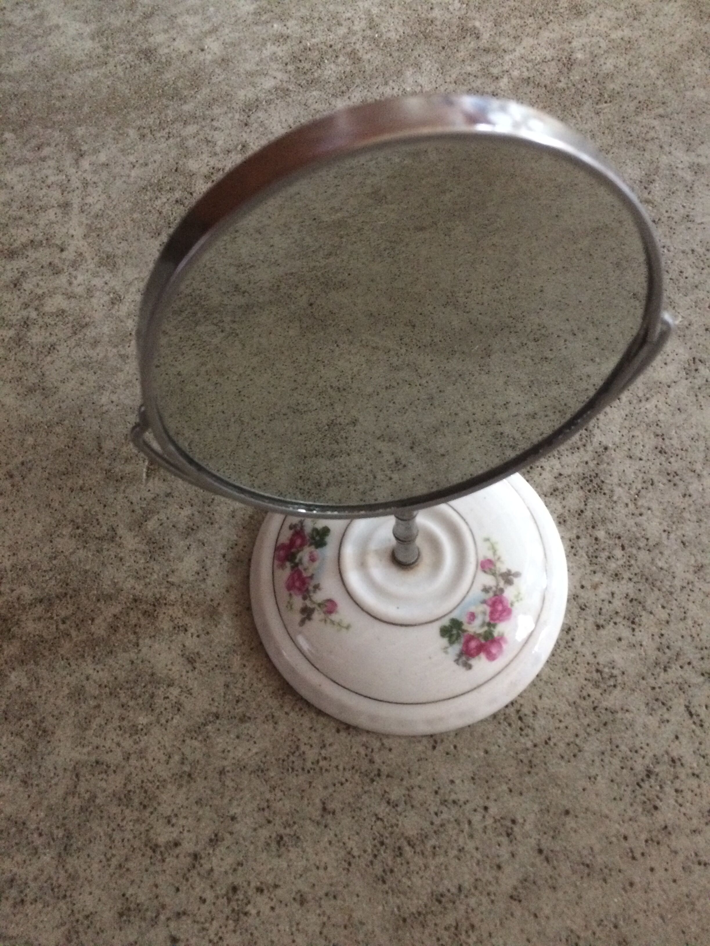 Porcelain swivel mirror