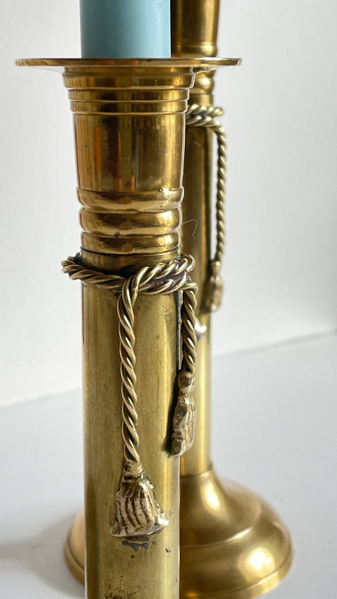 Trio of vintage knotted candlesticks brass