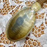 Wooden spoon and sandstone