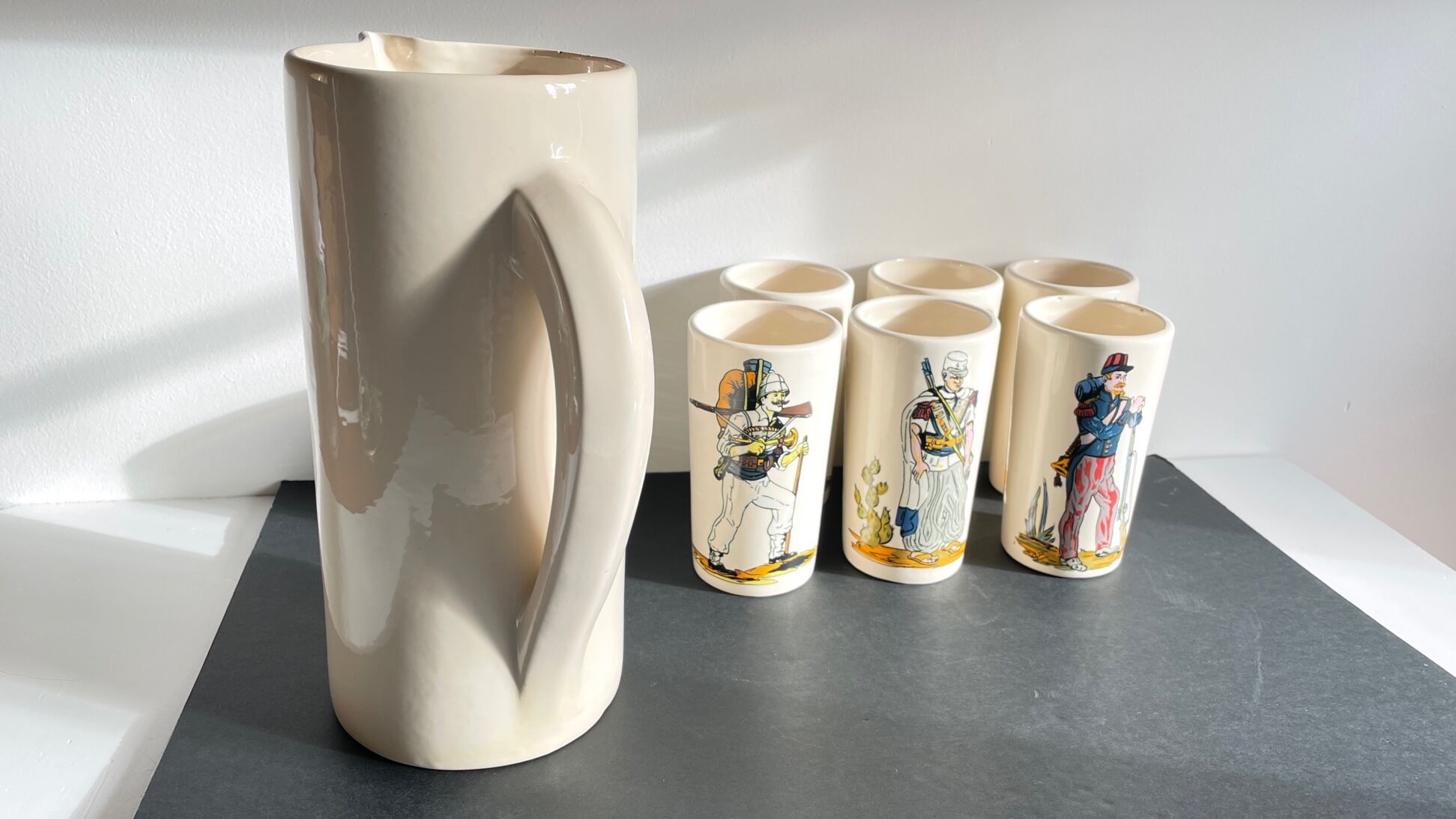 Orangeade service to vintage ceramic soldiers