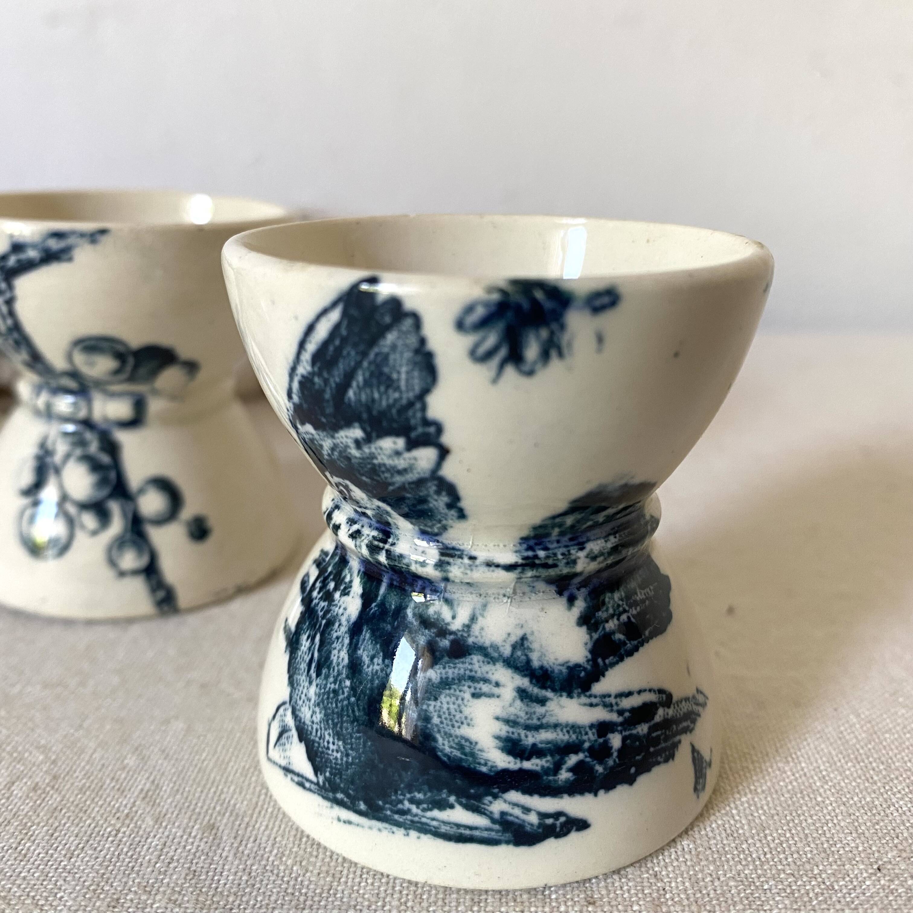 Old diabolo iron earth egg cups