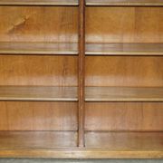 Pair of Sheraton Revival bookcases in satinwood, walnut, and yew.