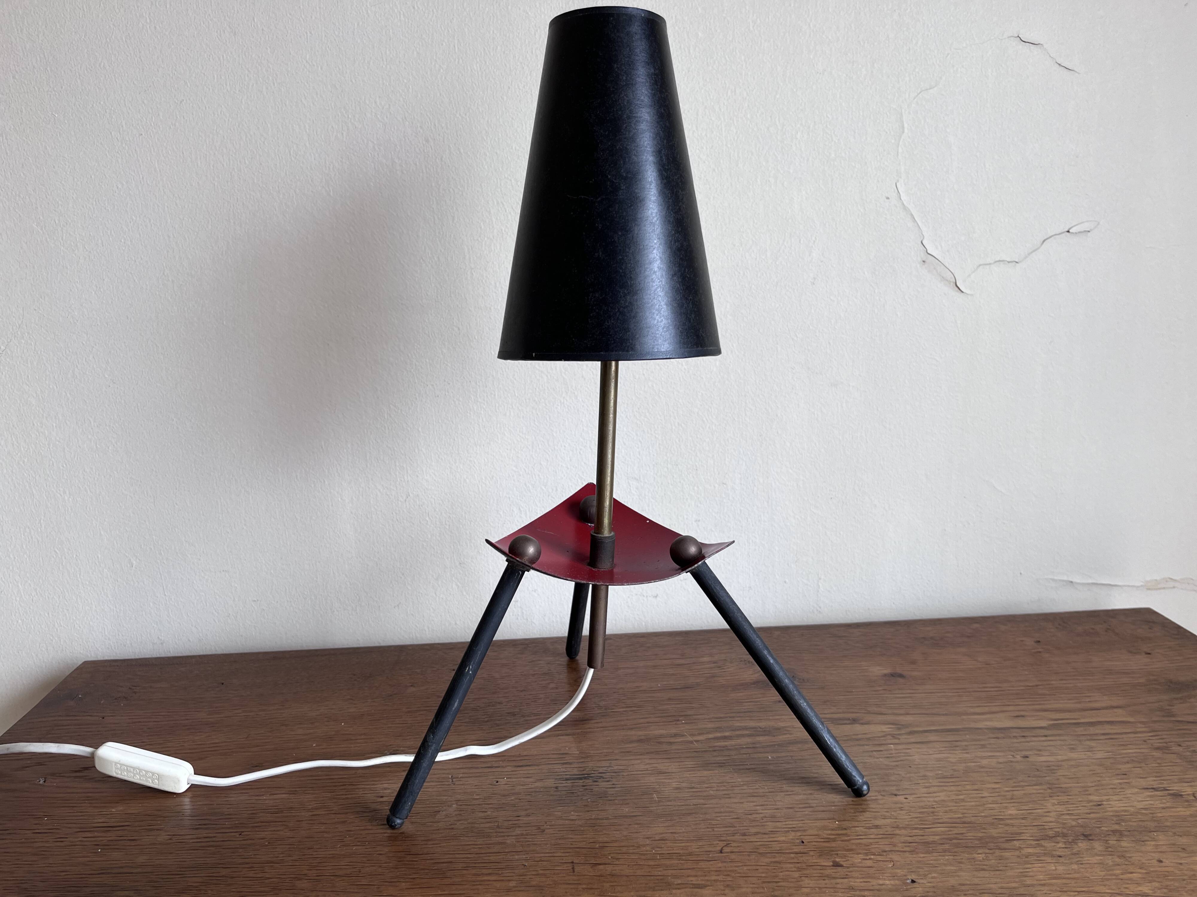 1950s modernist tripod lamp made of sheet metal and brass.