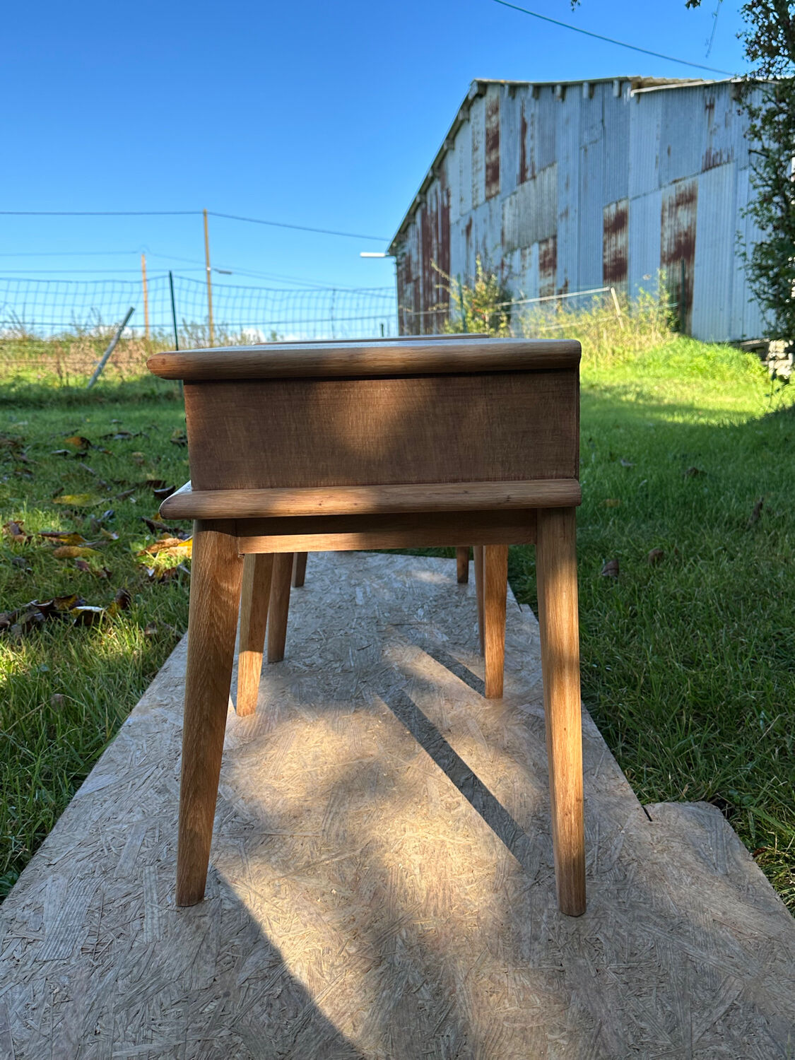 Vintage bedside tables with compass feet