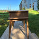 Vintage bedside tables with compass feet