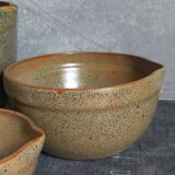 Three nesting pottery salad bowls in glazed stoneware