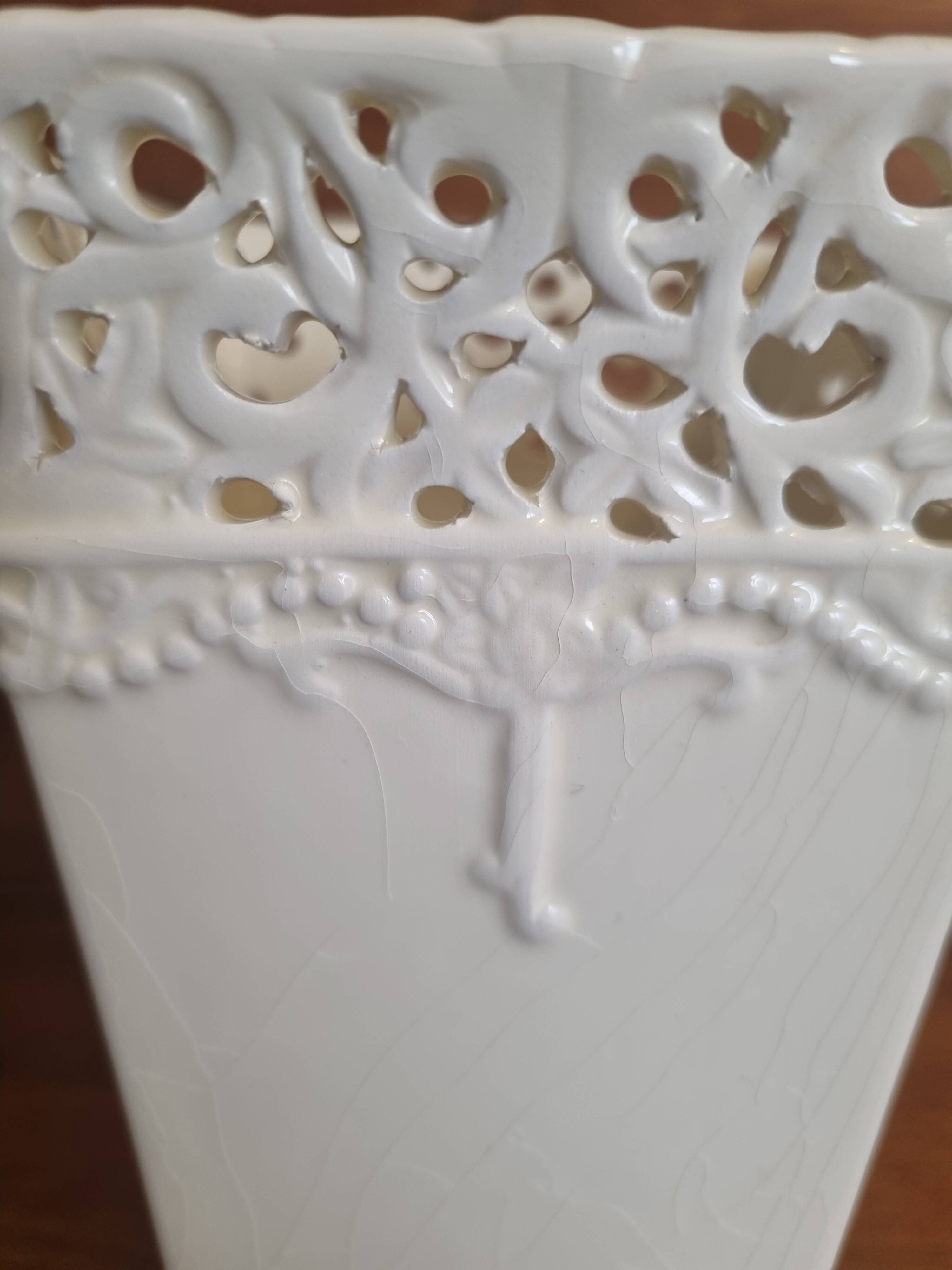 Vintage ceramic vase with lace edge