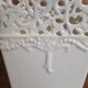 Vintage ceramic vase with lace edge